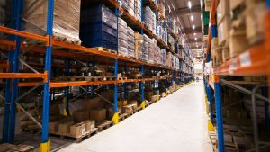 interior-of-large-distribution-warehouse-with-shelves-stacked-with-palettes-and-goods-ready-for-the-market-1